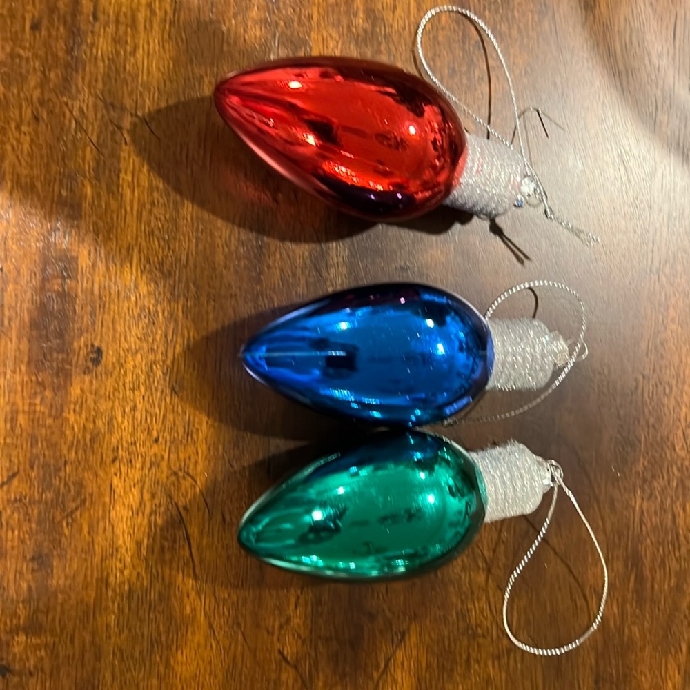 Set of 3 Christmas bulb ornaments. Silver glitter top and string. Shiny plastic